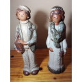 Nice Size Male & Female Glazed Clay Figurines