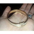 9ct Gold two-tone Oval shaped solid bangle with clasp