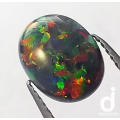 Black Opal Cabochon. Oval. 0.80ct | 9x7mm