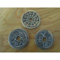 THREE VINTAGE CHINESE? BALINESE? COINS