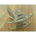 SMALL ORNAMENTAL SOLID BRASS ROCKING CHAIR