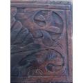 A VINTAGE INTRICATELY CARVED WOODEN BOX