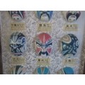 A VINTAGE BOXED FRAME DEPICTING VARIOUS FACIAL MASKS/CHARACTERS IN CHINESE OPERA