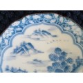 A BLUE AND WHITE ORIENTAL PIN DISH - SIGNED