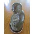 AN ANTIQUE CHINESE HOLLOW CAST BRONZE FIGURE OF SEATED BUDDHA
