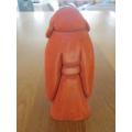 A CUTE 18CM TALL WOODEN BUDDHA WITH LARGE HANDS - UNUSUAL COLOUR