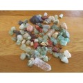 AN OLD BASKET FULL OF OVER EIGHTY ROUGH GEMSTONE ROCKS AND CRYSTALS