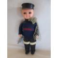 A SMALL  VINTAGE ROSEBUD, ENGLAND DOLL - CORNWALL FISHERMAN IN ORIGINAL OUTFIT WITH FISH AND NET