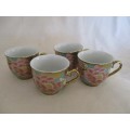 A SPECIAL DINNER? FOUR EXQUISITE GILT, FLORAL AND BUTTERFLY CUPS AND SAUCERS FOR AFTER DINNER COFFEE