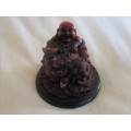 CHERRY RED RESIN GOOD FORTUNE BUDDHA WITH FENG SHUI FROG SITTING ON COINS - SIGNED