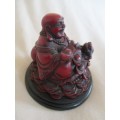CHERRY RED GOOD FORTUNE BUDDHA WITH FENG SHUI FROG SITTING ON COINS - SIGNED