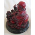 CHERRY RED RESIN GOOD FORTUNE BUDDHA WITH FENG SHUI FROG SITTING ON COINS - SIGNED