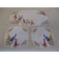 A VINTAGE RECTANGULAR HAND EMBROIDERED VANITY SET WITH PRETTY HOLLYHOCKS AND  HAND CROCHETED BORDERS