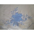 TWO VINTAGE EMBROIDERED ROUND CLOTHS WITH APPLIQUED LILIES