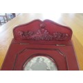 A DECORATIVE WOODEN BOX WITH PHOTO FRAME ON LID