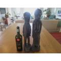LARGE HAND CARVED AFRICAN STATUE OF MAN AND WOMAN