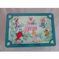 A LARGE BAKERS BISCUIT TIN WITH CHARMING SCENES FROM ALICE IN WONDERLAND