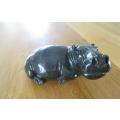 A HEAVY HAND CARVED STONE HIPPO (SIGNED MAJOR ON BASE)