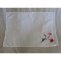 A VINTAGE RECTANGULAR VERY NEATLY HAND EMBROIDERED CLOTH WITH FLORAL DESIGN