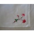 A VINTAGE RECTANGULAR VERY NEATLY HAND EMBROIDERED CLOTH WITH FLORAL DESIGN