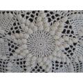 A small vintage hand crocheted cushion - expertly crocheted