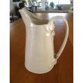 Very large Di Marshall Wonki Ware jug with raised floral touches
