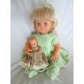 Beautiful First Love Baby Love twisty body doll holding her own vintage dolly