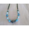 A very pretty necklace with blue beads