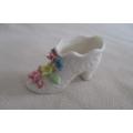 A cute small floral porcelain shoe to add to your order