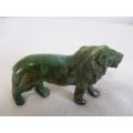 Detailed hand carved lion - green stone