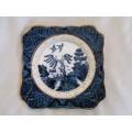 An unusual square blue and white willow pattern display plate with gold gilt detail