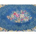 A vintage, good quality rug with floral design