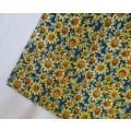 A rectangular cloth with pretty `granny print` design