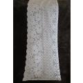 Quality, long `half mast` lace curtain with textured rose design - 253cm x 37cm