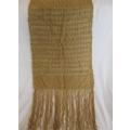 A very soft vintage hand crocheted shawl in lovely old gold colour to wear or to drape