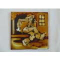 A vintage 1960`s hand painted and glazed Liebermann tile of a man with his bottle - discontinued