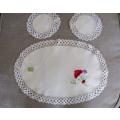 A beautiful Pure Irish linen set - larger embroidered oval cloth plus two small round ones