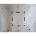 A lovely large embroidered Madeira-style table cloth with lovely trumpet flower design
