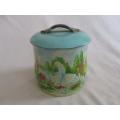 Vintage `lady in the garden` cookie tin