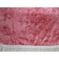 A pretty pink velvet oval cloth with tassels