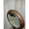 Upright wooden shaving mirror with metalwork decorative detail