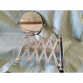 Extendable magnifying mirror