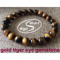 100% real golden tiger eye gemstone. Feng Shui healing benefits, 8mm bracelet. Good fortune.