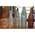 COLLECTION OF FIVE VINTAGE BOTTLE'S