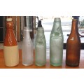 COLLECTION OF FIVE VINTAGE BOTTLE'S