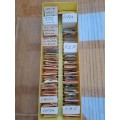 box of sorted and originally packed new vintage watch winding stems