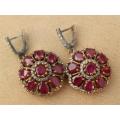 Exquisite heavy sterling silver ruby earrings - weight 17.28 g.