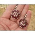 Exquisite heavy sterling silver ruby earrings - weight 17.28 g.