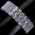 Exquisite 14 ct white gold over solid sterling silver bracelet with 298 natural Tanzanites, 54 g