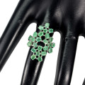 Spectacular solid sterling silver 14 ct white gold finish ring with 24 natural emeralds.